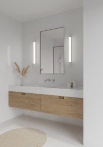 Lampa ścienna MALAIKA Nordlux 1xLED Aluminium Biały w eleganckiej łazience z nowoczesnym lustrem.