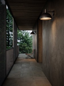 Lampa ścienna ARKI Nordlux 1xE27 20W Metal Czarny na zewnętrznej ścianie tarasu.