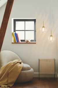 Lampa wisząca CHISELL Nordlux 1xE14 25W Metal Mosiądz w nowoczesnym wnętrzu.