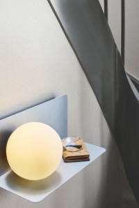 Lampa ścienna LILIBETH Nordlux metal niebieski 1xE14 25W zamontowana na ścianie.