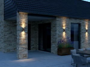 Lampa ścienna NICO Nordlux 2xGU10 35W Aluminium Zardzewiały zamontowana na fasadzie domu.