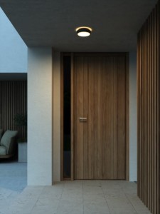 Lampa ścienna OLIVER Nordlux 1xLED Tworzywo sztuczne Czarny przy drzwiach wejściowych.