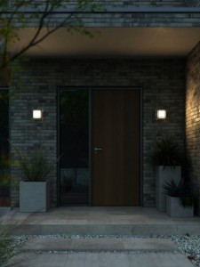 Lampa ścienna OLIVER Nordlux LED przy drzwiach wejściowych.