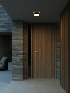 Lampa ścienna OLIVER Nordlux 1xLED przy drzwiach wejściowych.