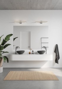 Lampa ścienna TINIA Nordlux 1xLED Metal Czarny zamontowana nad lustrem w nowoczesnej łazience.