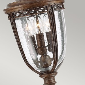 Latarnia ogrodowa Elstead Lighting English Bridle FE-EB4-M-BRB IP44 3xE14 Stal Brązowy z trzema żarówkami wewnątrz szklanego klosza.