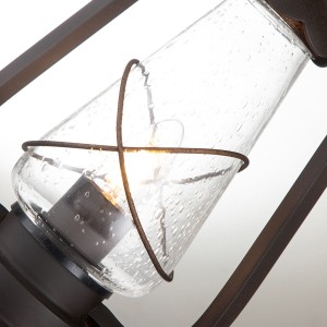 Latarnia ogrodowa Elstead Lighting Miners MINERS-PED IP44 1xE27 Stal Brązowy - zbliżenie na szklany klosz z widoczną żarówką.