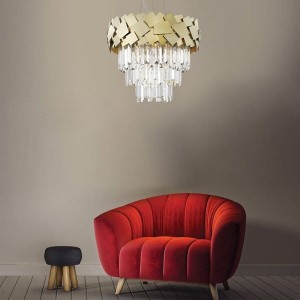 Lampa Wisząca Quasar Zuma line 6x40W E14 Złoty Metal zawieszona nad czerwonym fotelem w nowoczesnym wnętrzu.