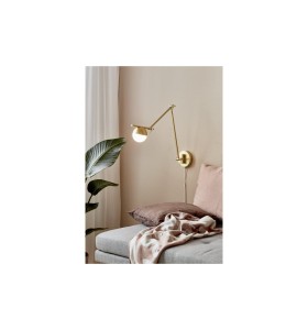 Lampa ścienna Kinkiet Nordlux G9 5W Metal Mosiądz nad kanapą.