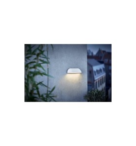 Lampa Ścienna Nordlux LED Metal Biały zamontowana na zewnętrznej ścianie budynku.