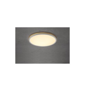 Lampa sufitowa Plafon okrągły OJA NORDLUX 1x22W LED Biały Tworzywo na tle szarej ściany.