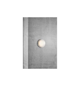 Lampa Ścienna Nordlux LED Plastik Biały na tle betonowej ściany.