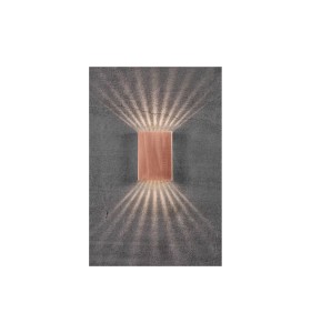 Lampa Ścienna Nordlux LED Miedź na betonowej ścianie.