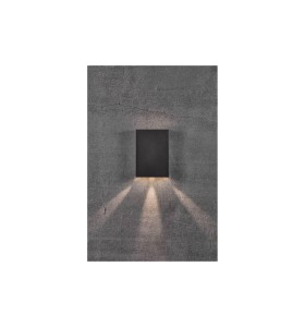 Lampa Ścienna Nordlux LED Aluminium Czarny na betonowej ścianie.