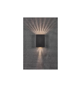 Lampa Ścienna Nordlux LED Aluminium Czarny zamontowana na betonowej ścianie.