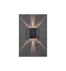 Lampa Ścienna Nordlux LED Aluminium Czarny zamontowana na betonowej ścianie.